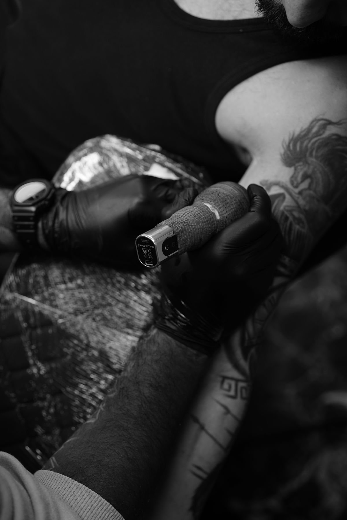 Tattoo machine on skin